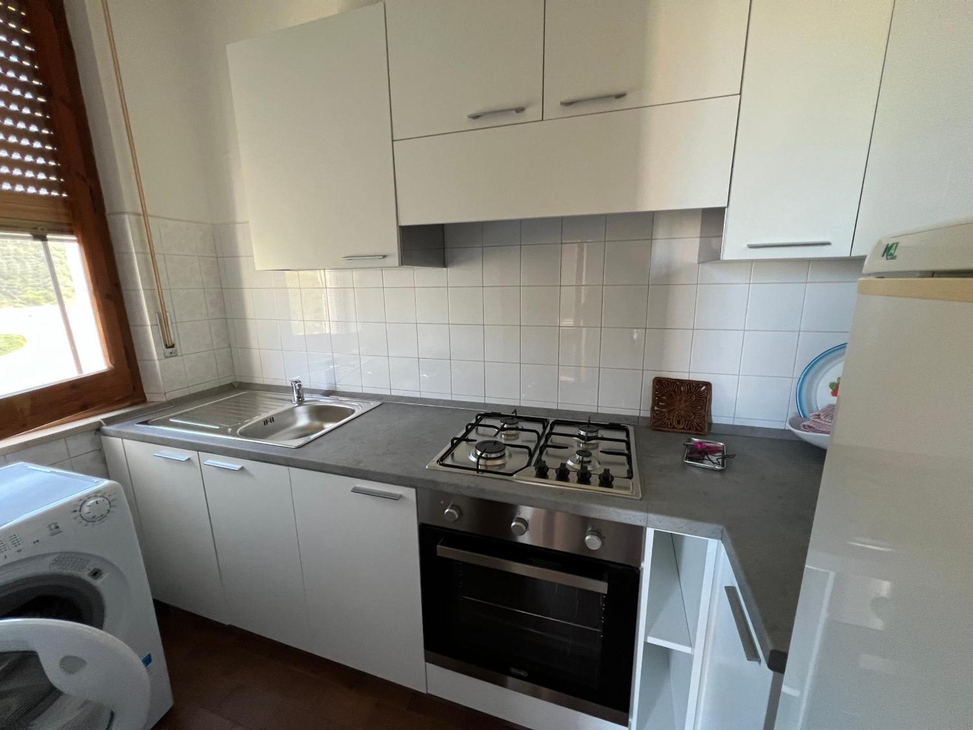 Ampio Appartamento Marina Di Арбус Екстериор снимка