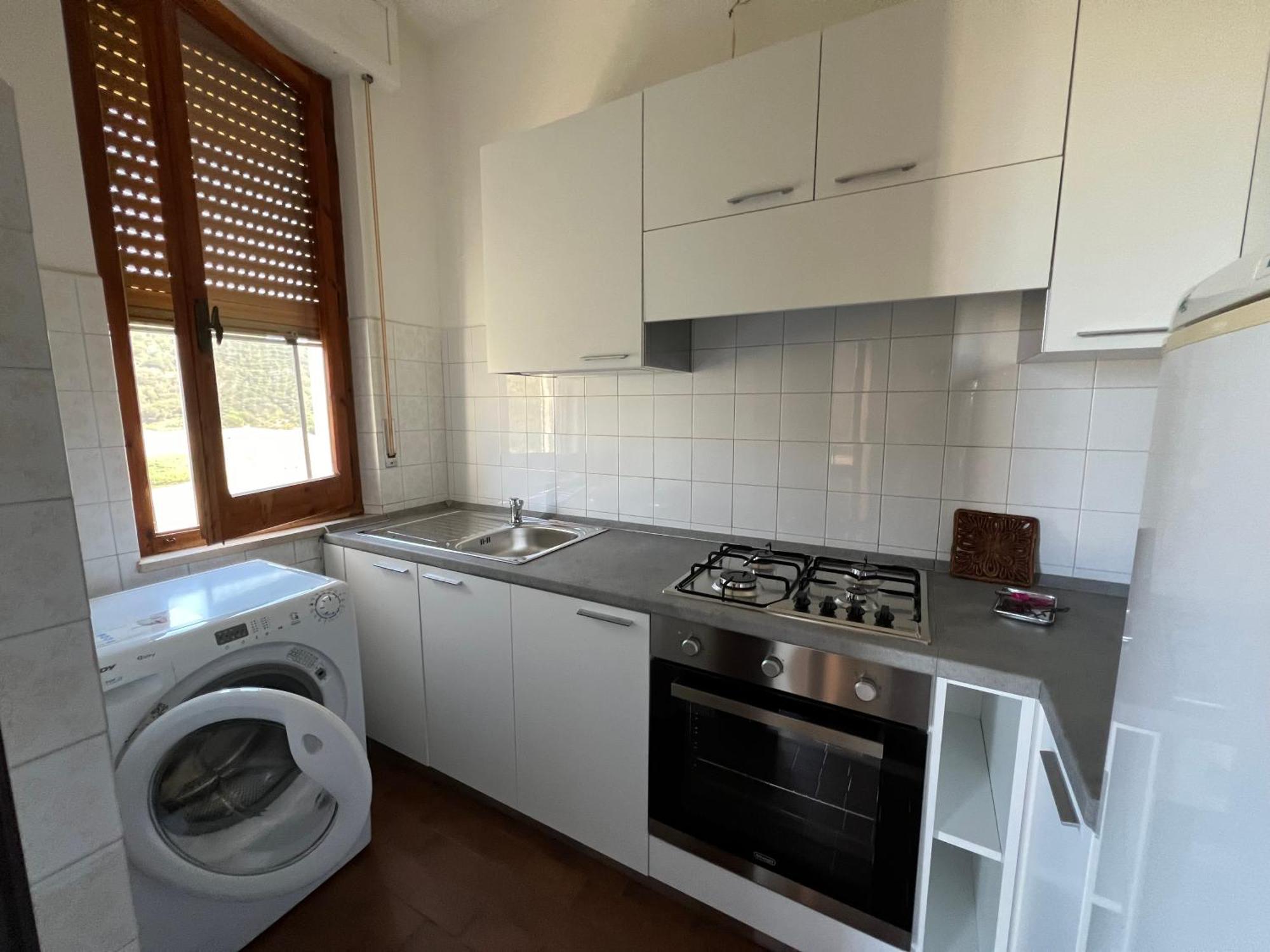 Ampio Appartamento Marina Di Арбус Екстериор снимка